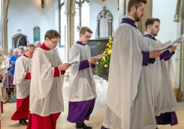 Choir walking up to the alter