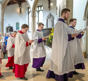 Choir walking up to the alter